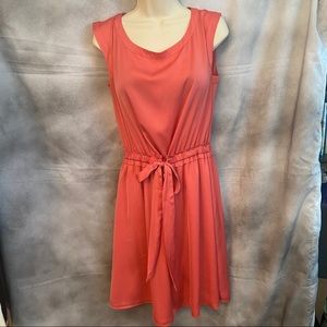 Get the scoop w/ this beautiful coral sheath dress